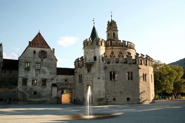 Castle with fountain in courtyard