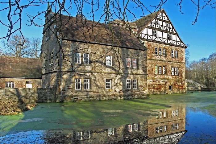 Schloss Schweckhausen castle reflected in water