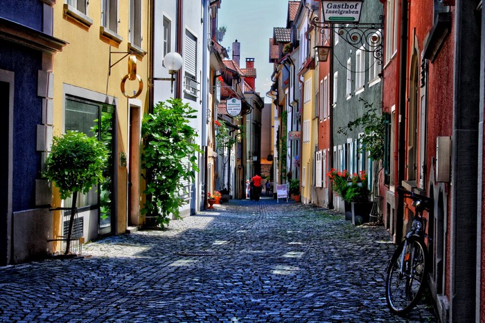 Cobblestone alley with colorful buildings in Germany