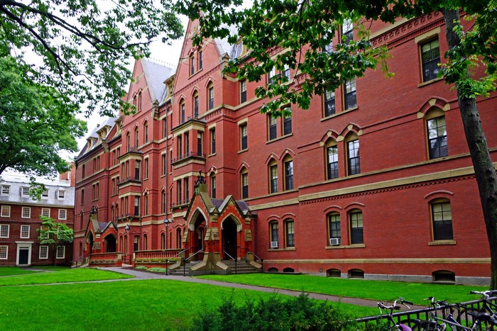 Harvard University building with lawn and trees