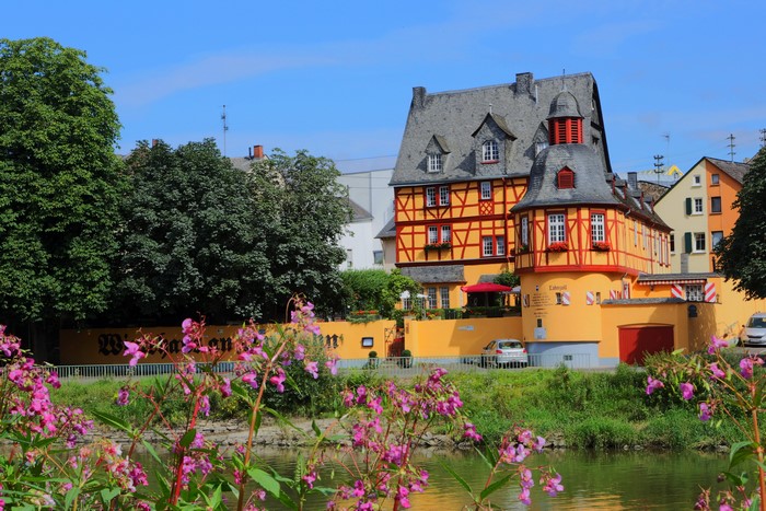 Half-timbered buildings by a river in Germany