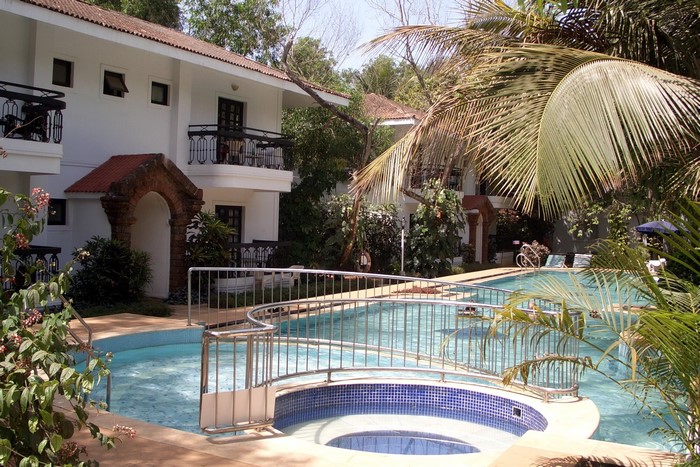 Resort with swimming pools and palm trees