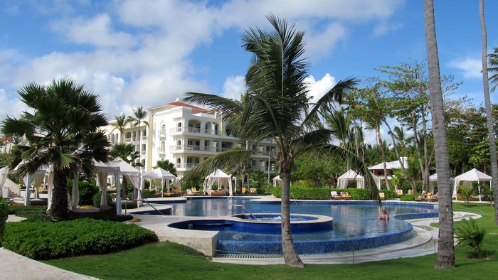 Resort with swimming pools and palm trees