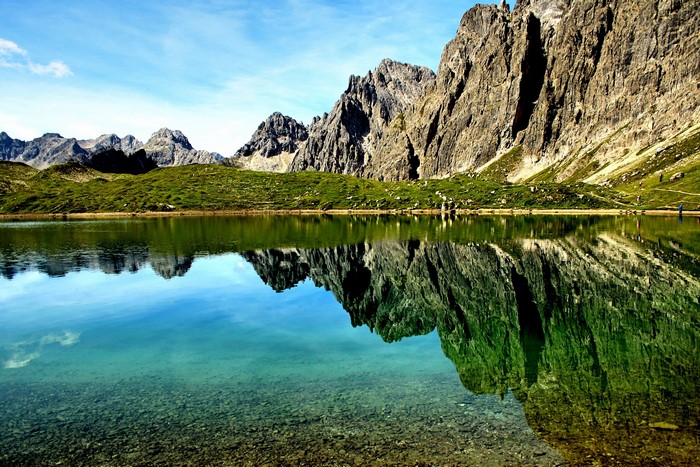 Mountains reflected in a clear lake