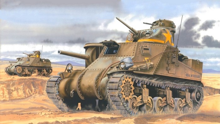 Two M3 Lee tanks in a desert landscape