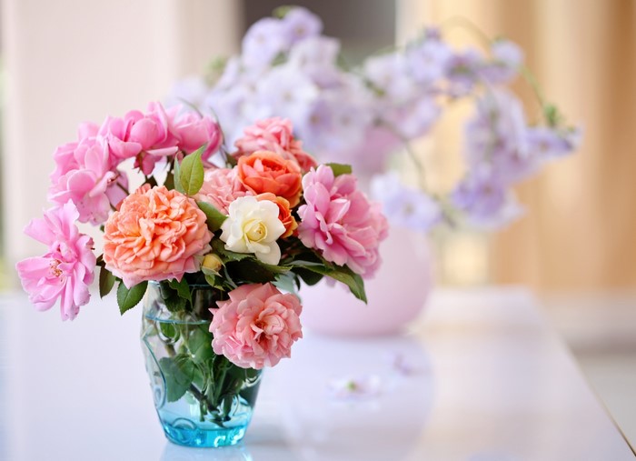 Bouquets of Roses in a Blue Vase