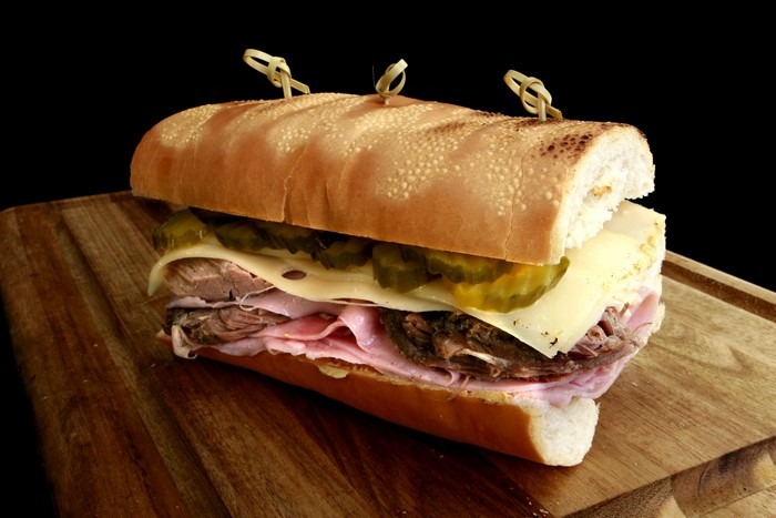 Cuban sandwich with pickles and cheese