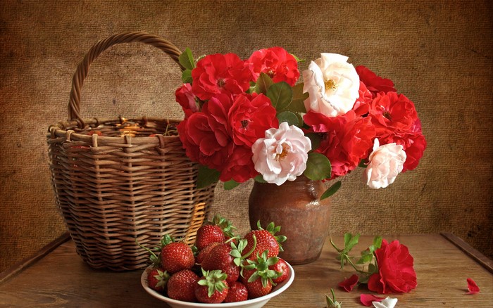 Still life with roses, strawberries, and basket
