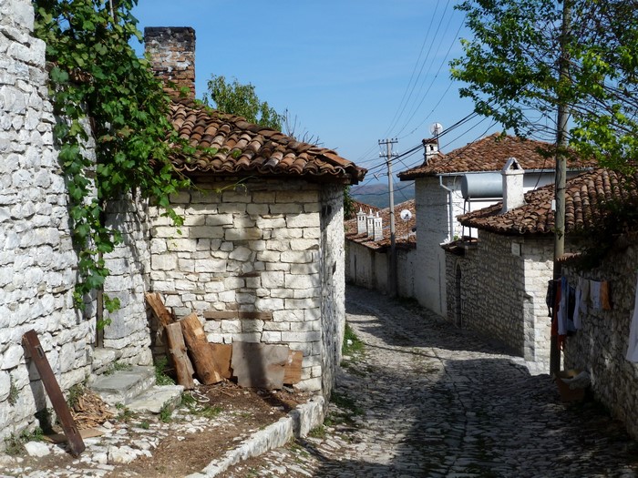 Stone houses on a cobblestone street
