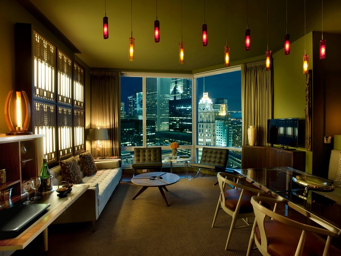 Luxury hotel room with city view at night