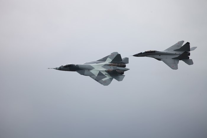Two Russian fighter jets flying in formation