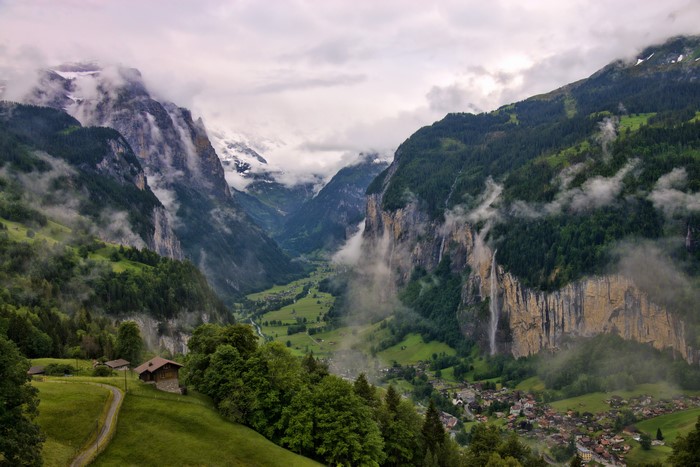 Lauterbrunnen Valley, Switzerland with waterfalls and clouds