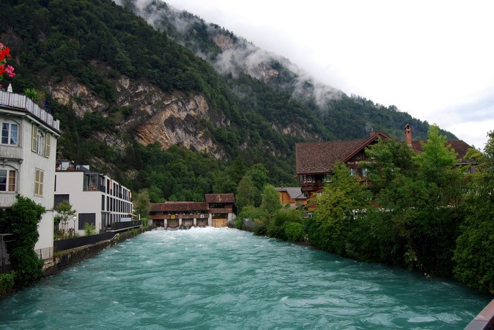 River flowing through Interlaken, Switzerland with mountains