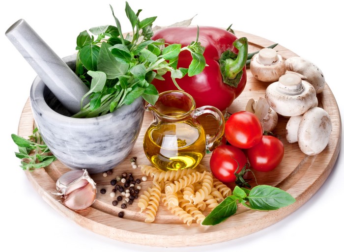 Ingredients for Italian Cooking on a Wooden Board