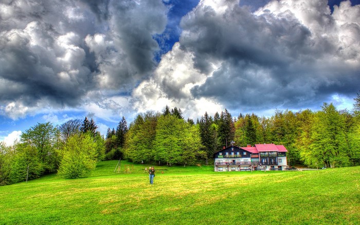 House in Hrastnik, Slovenia with a person walking