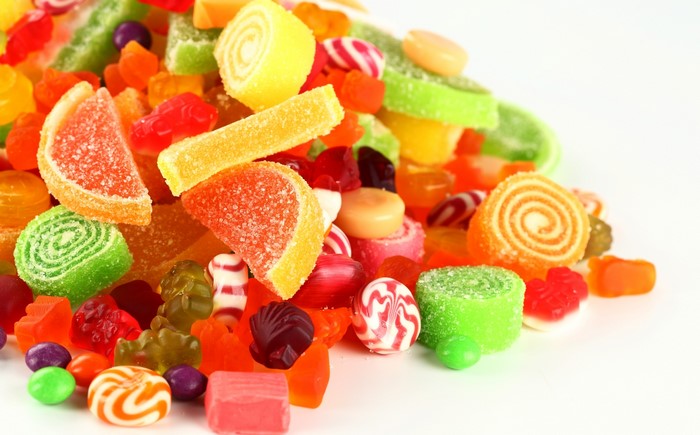 A pile of colorful assorted candies and sweets