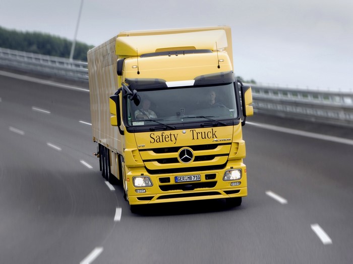 Yellow Mercedes-Benz Actros Safety Truck on Highway