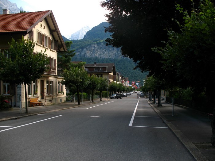 Street in Meiringen, Switzerland with Mountains