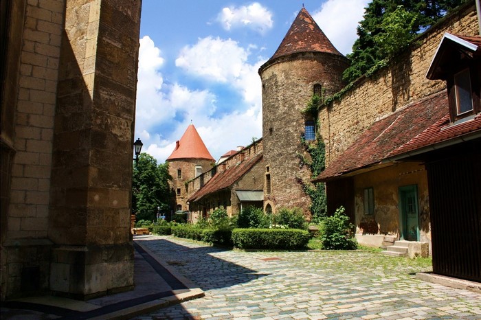 Stone towers and buildings with red roofs in Croatia
