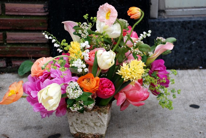 Colorful floral arrangement in a square vase