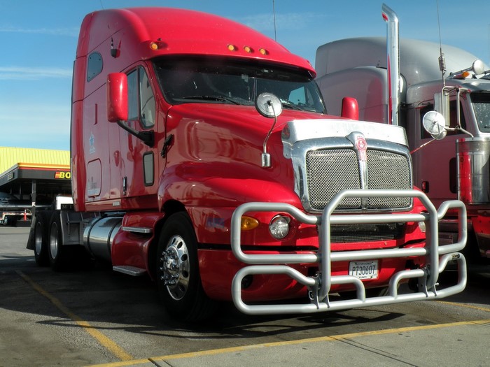 Red Kenworth Semi-Truck with Bull Bar