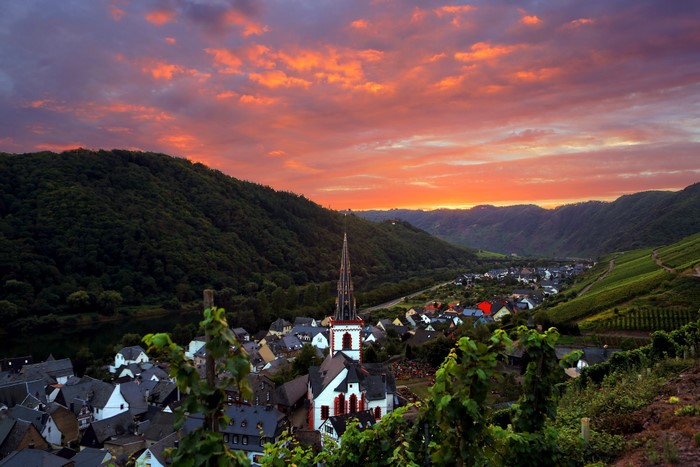 Village church in a valley at sunset, Germany