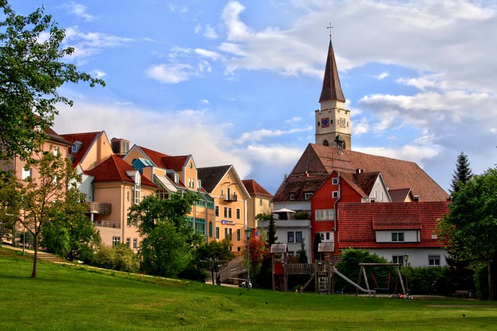 Town with church tower and colorful houses in Germany