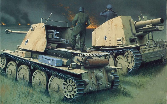 German SPGs with soldiers in a field