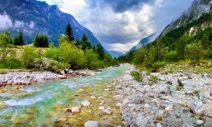 Mountain river flowing through a rocky valley