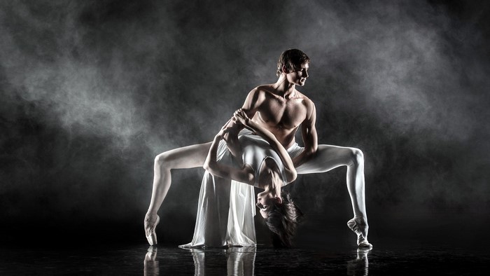 Ballet dancers performing a dramatic pose