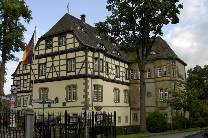 Heerse Castle in Germany with German Flag