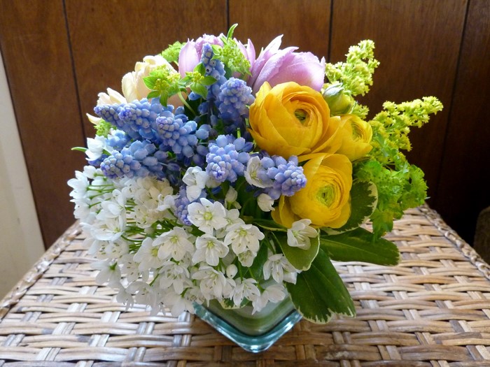 Spring flower arrangement with tulips and ranunculus