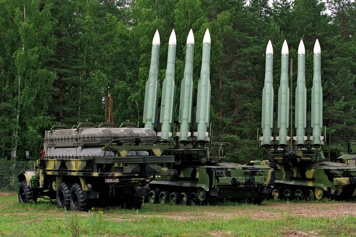 Russian missile launchers with rockets in a forest