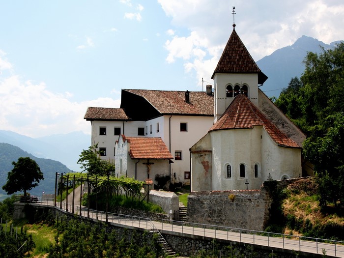 Church and buildings in Tirolo, Italy