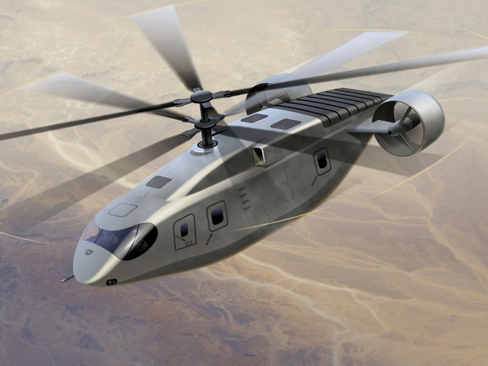 Futuristic helicopter flying over a desert landscape