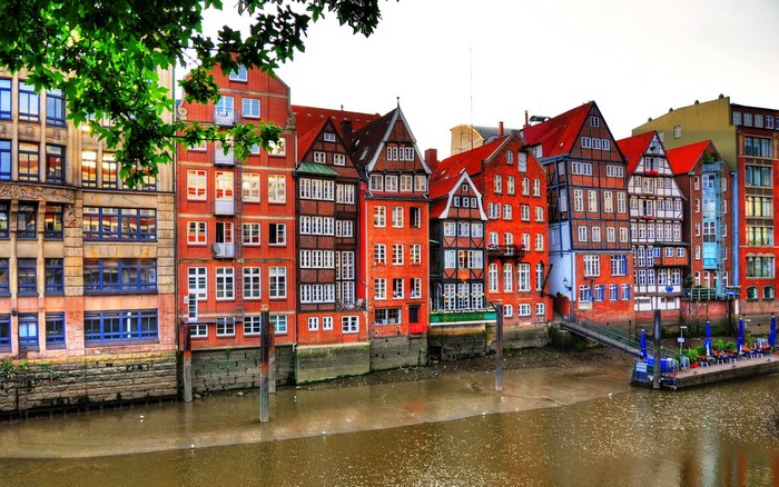Colorful historic buildings along a canal in Hamburg, Germany