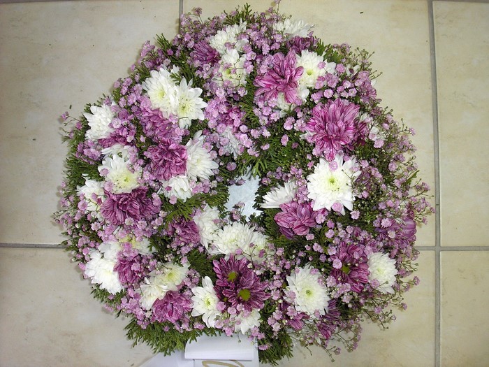 Wreath of white and purple chrysanthemums