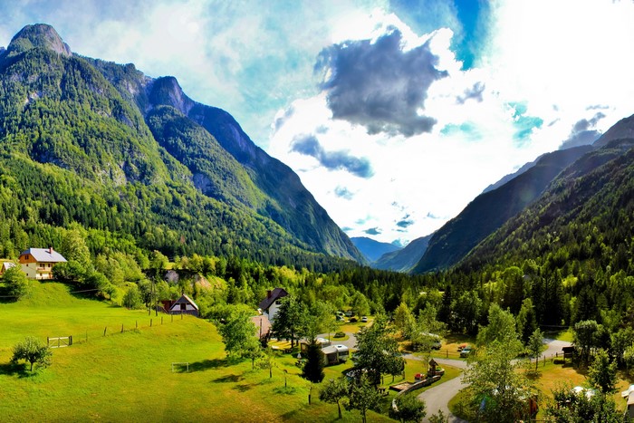 Mountain valley with houses and a campsite