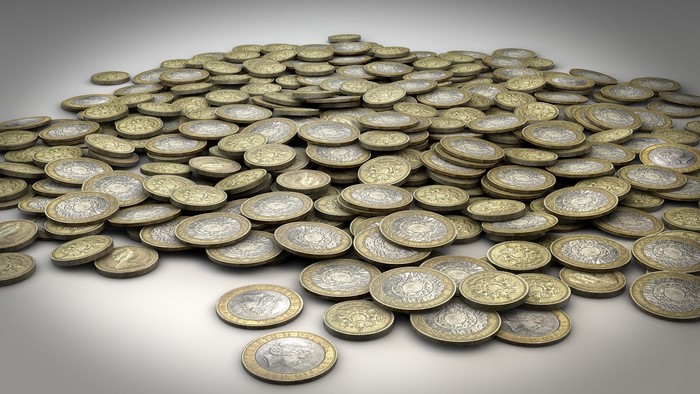 A large pile of gold and silver coins