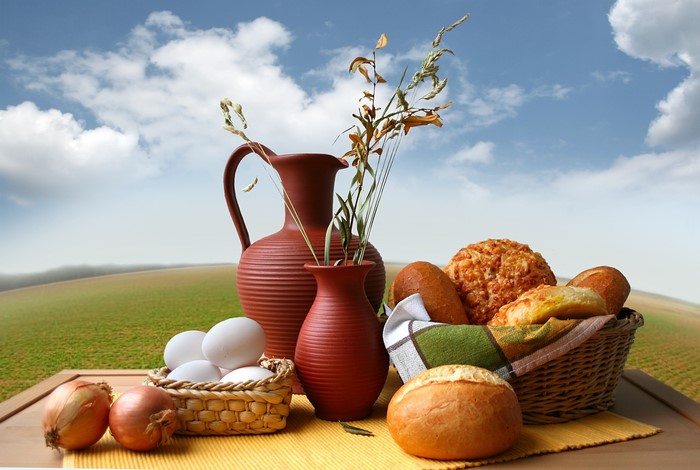 Still life with bread, eggs, and pottery