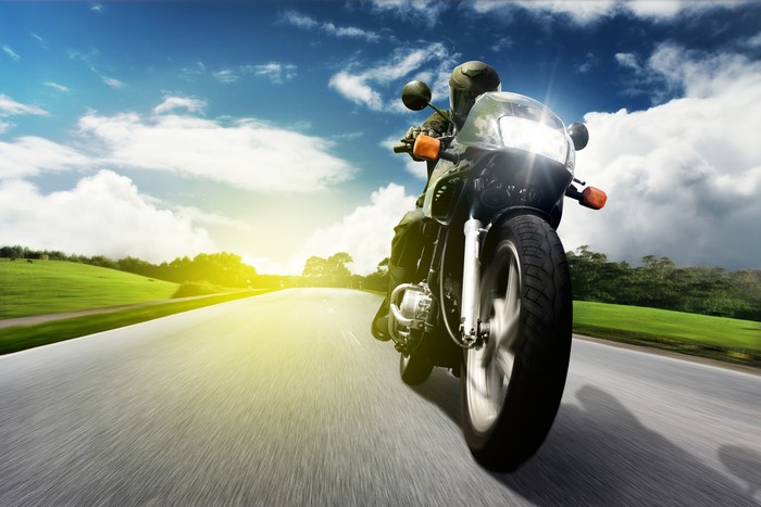 Motorcyclist on a Road