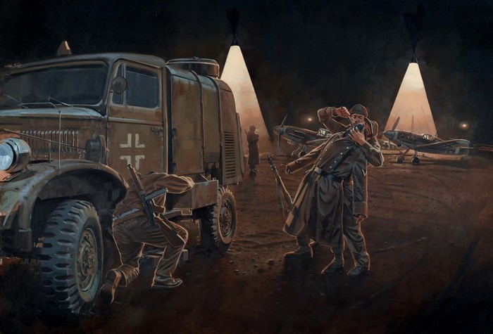 German soldiers and aircraft on an airfield at night