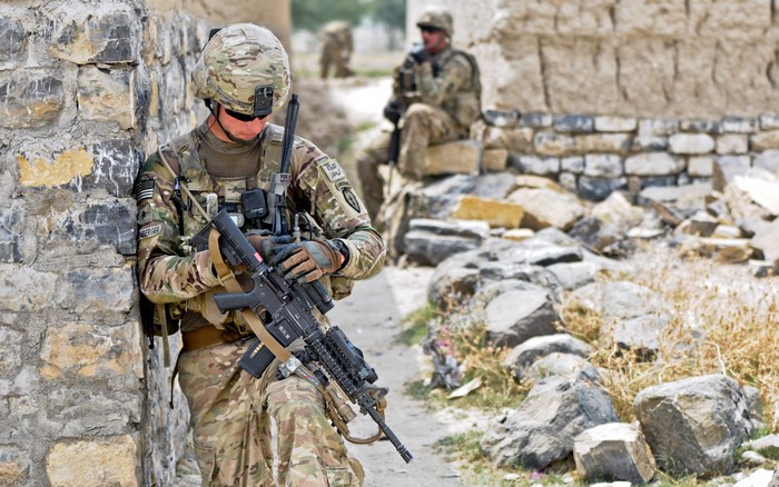 Soldiers in a war-torn environment