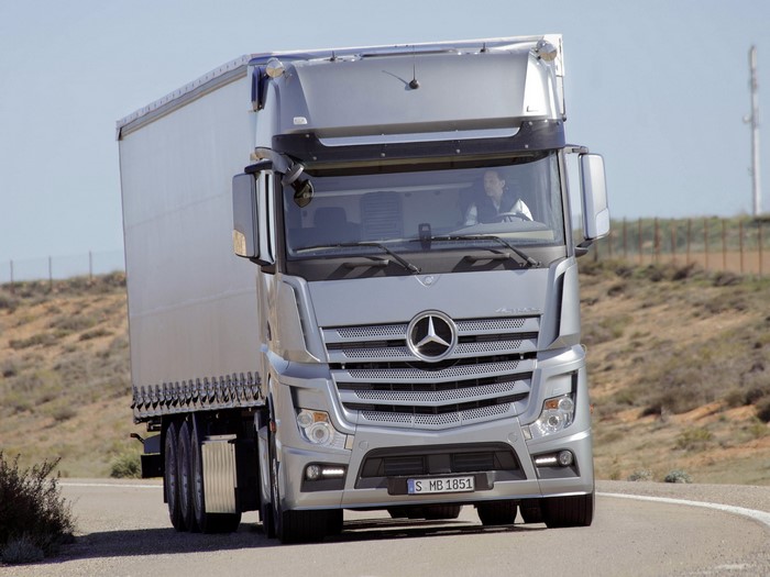 Mercedes-Benz Actros Truck Driving on Road