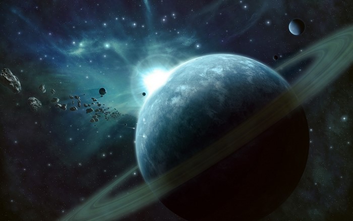 Planet with rings and asteroids in space