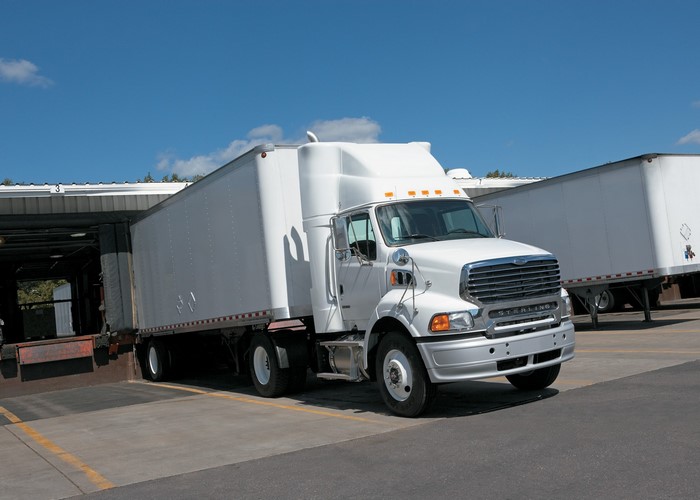 Sterling Trucks at a Loading Dock