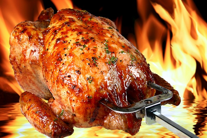 4K Roast Chicken on a Spit with Flames