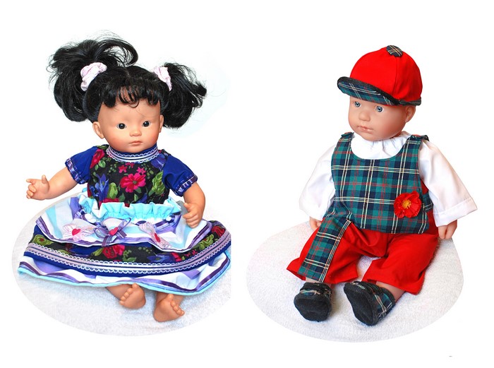 Two dolls, one girl doll and one boy doll