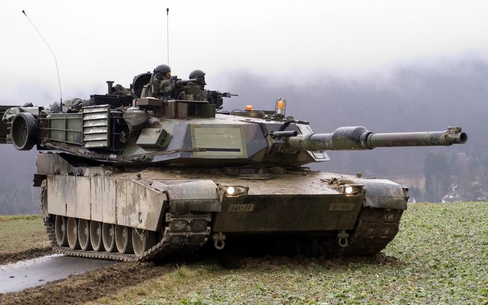 M1 Abrams tank in a muddy field