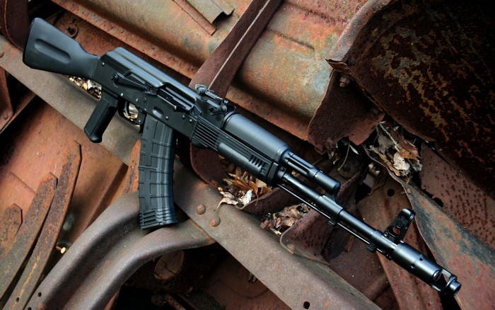 AK-74 assault rifle on rusty metal